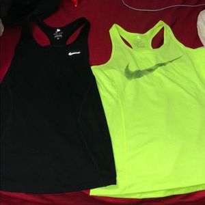 Two Nike Dri-Fit tank tops